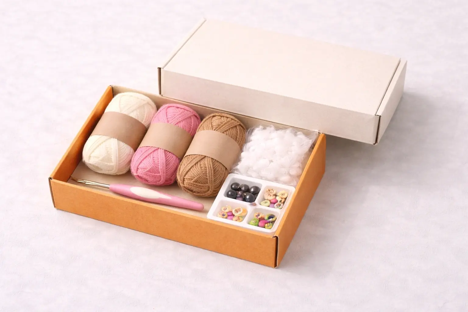 Packaging structure detail for retail-ready beginner crochet kits